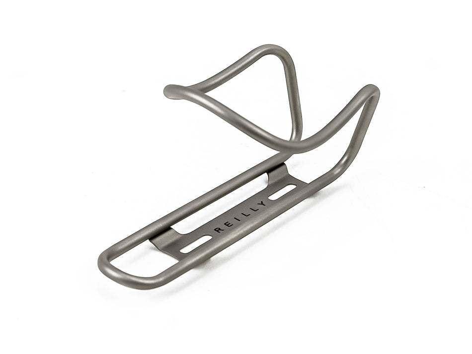 Reilly branded titanium bottle cage on white background 