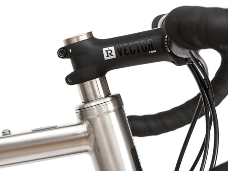 Side view of Reilly branded vector stem on a bike.