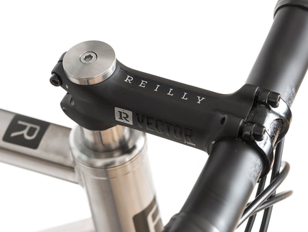 Reilly branded vector stem on a bike shot from above.