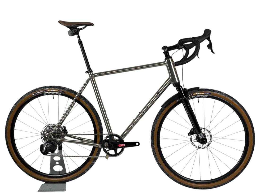 TITANIUM BIKE WITH SUSPENSION FORK.