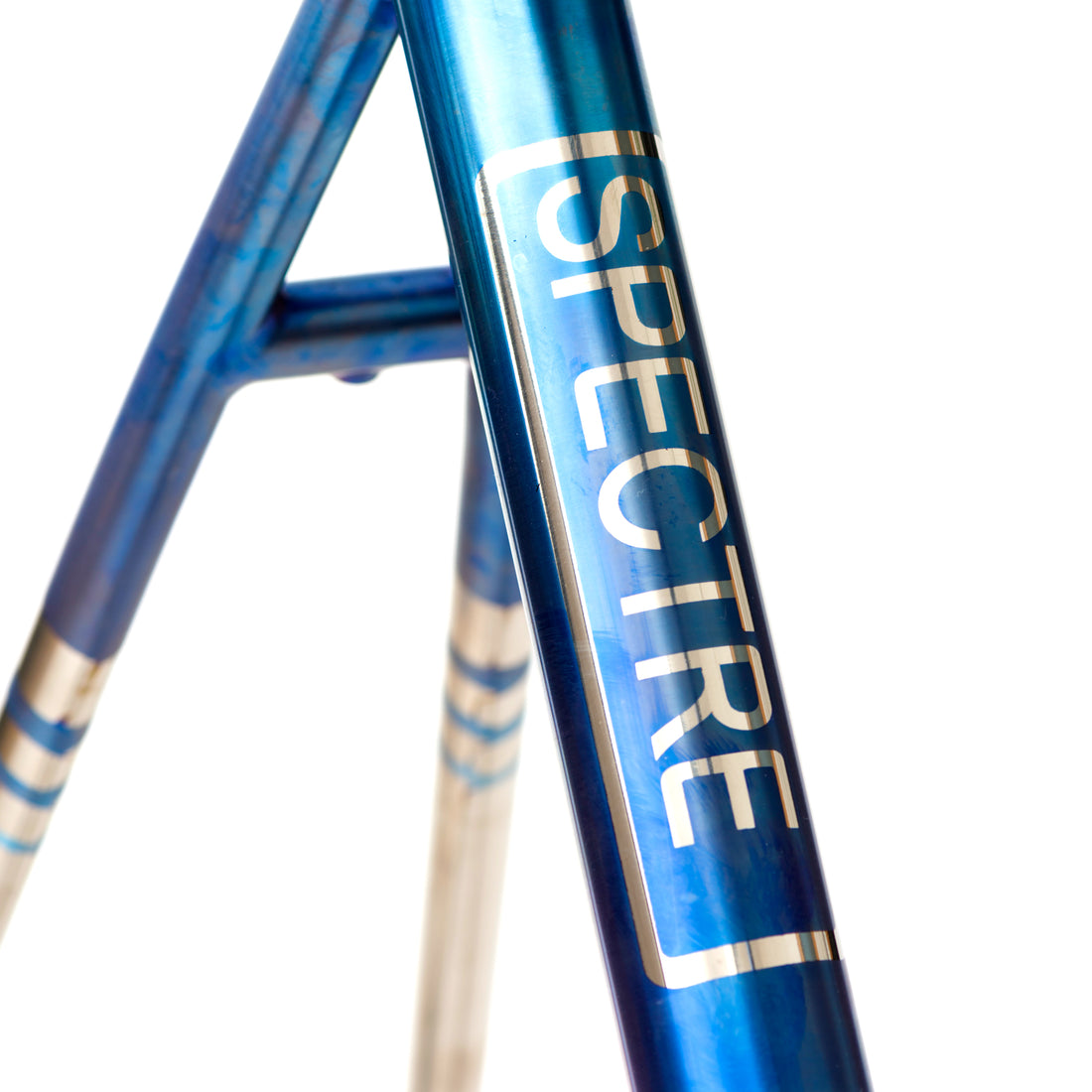 Blue anodised graphics on to a titanium bike. 