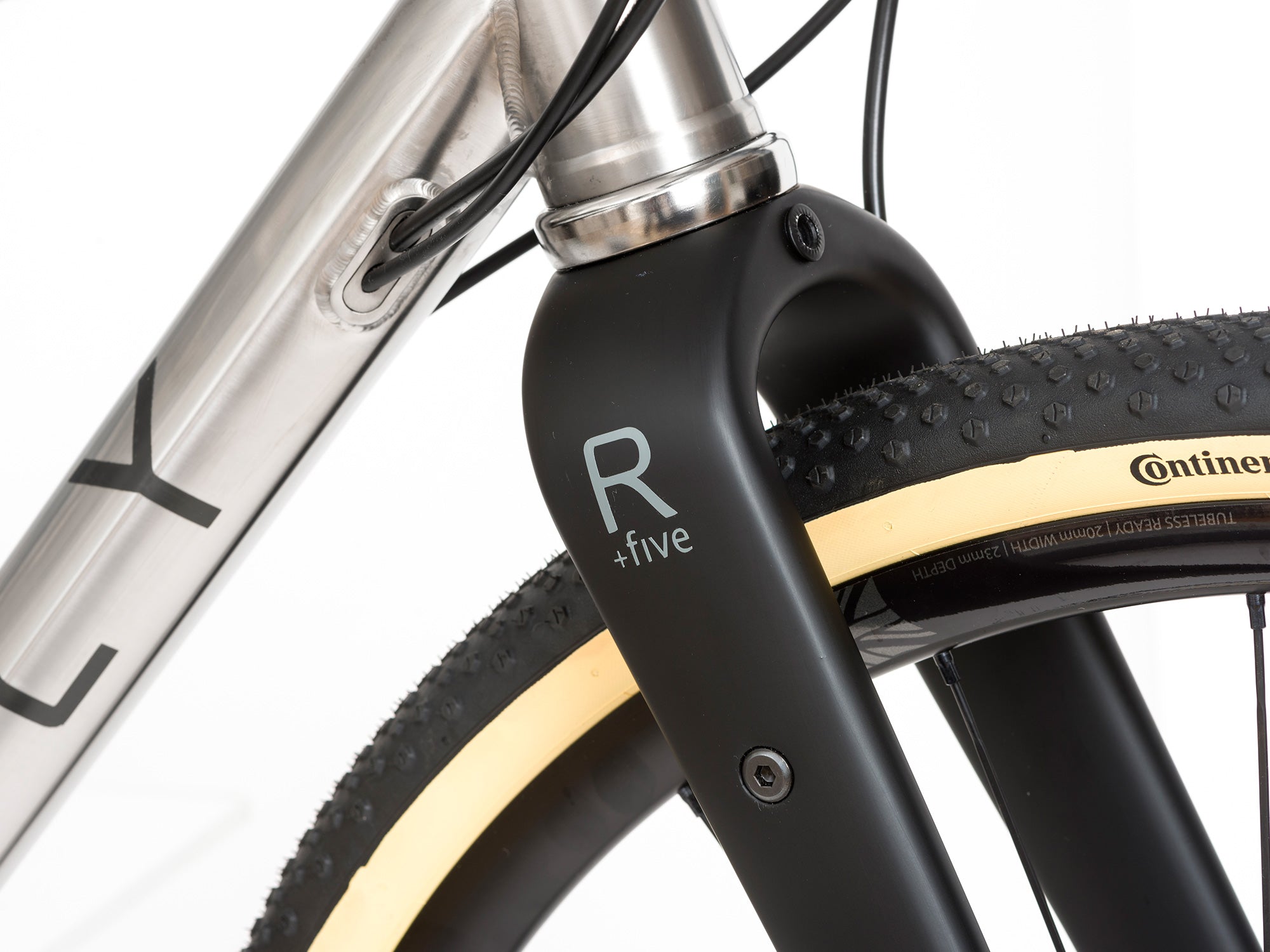 close up of the reilly logo on a Reilly carbon adventure fork on a bike 