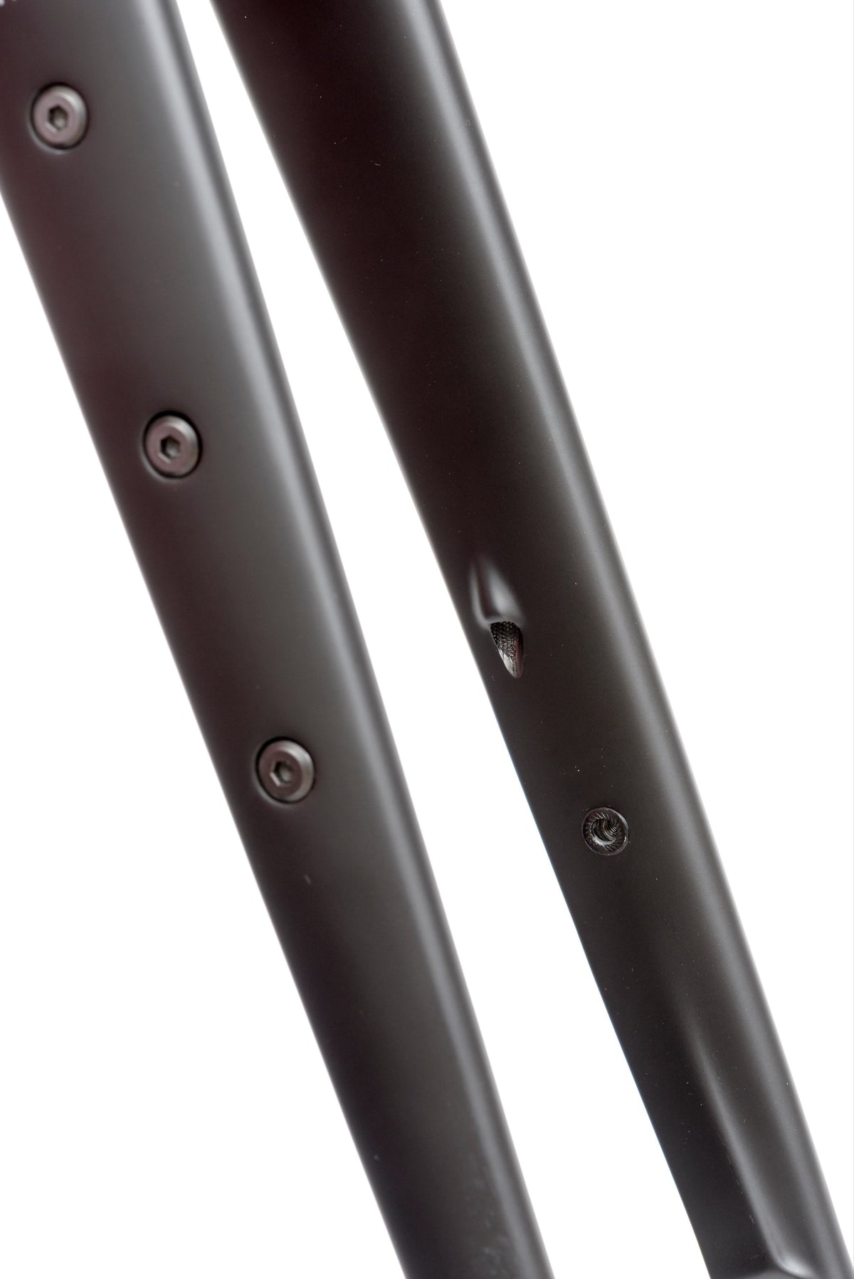 close up of Reilly carbon adventure fork against white background showing mount fixings