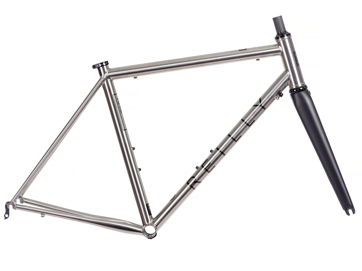 Side view of the T325 caliper frameset in brushed titanium with black decals. 